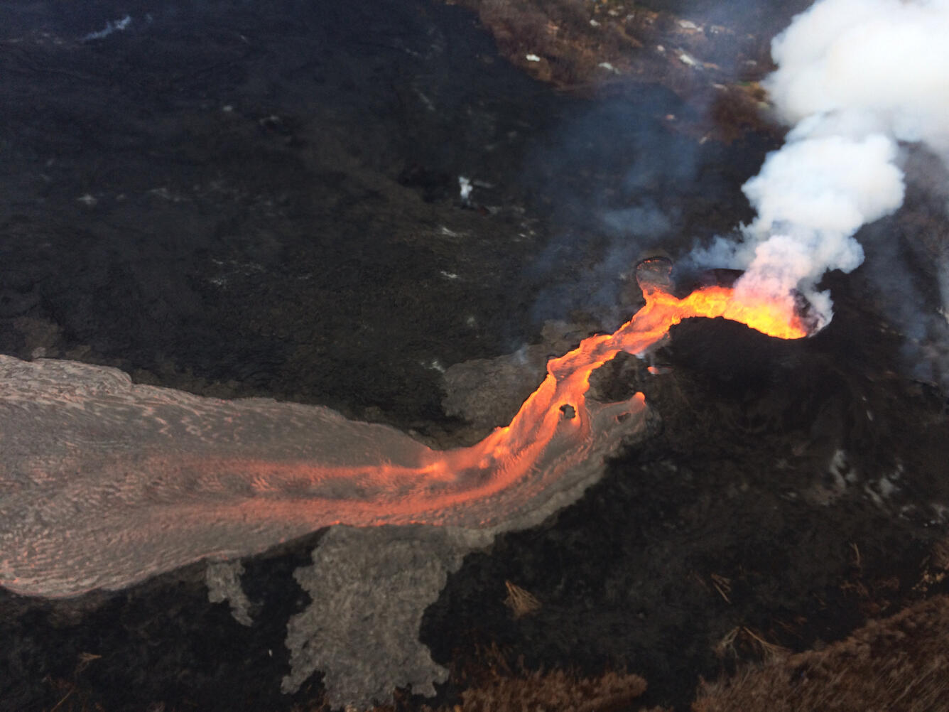 Aerial view of a fissure and lava flow