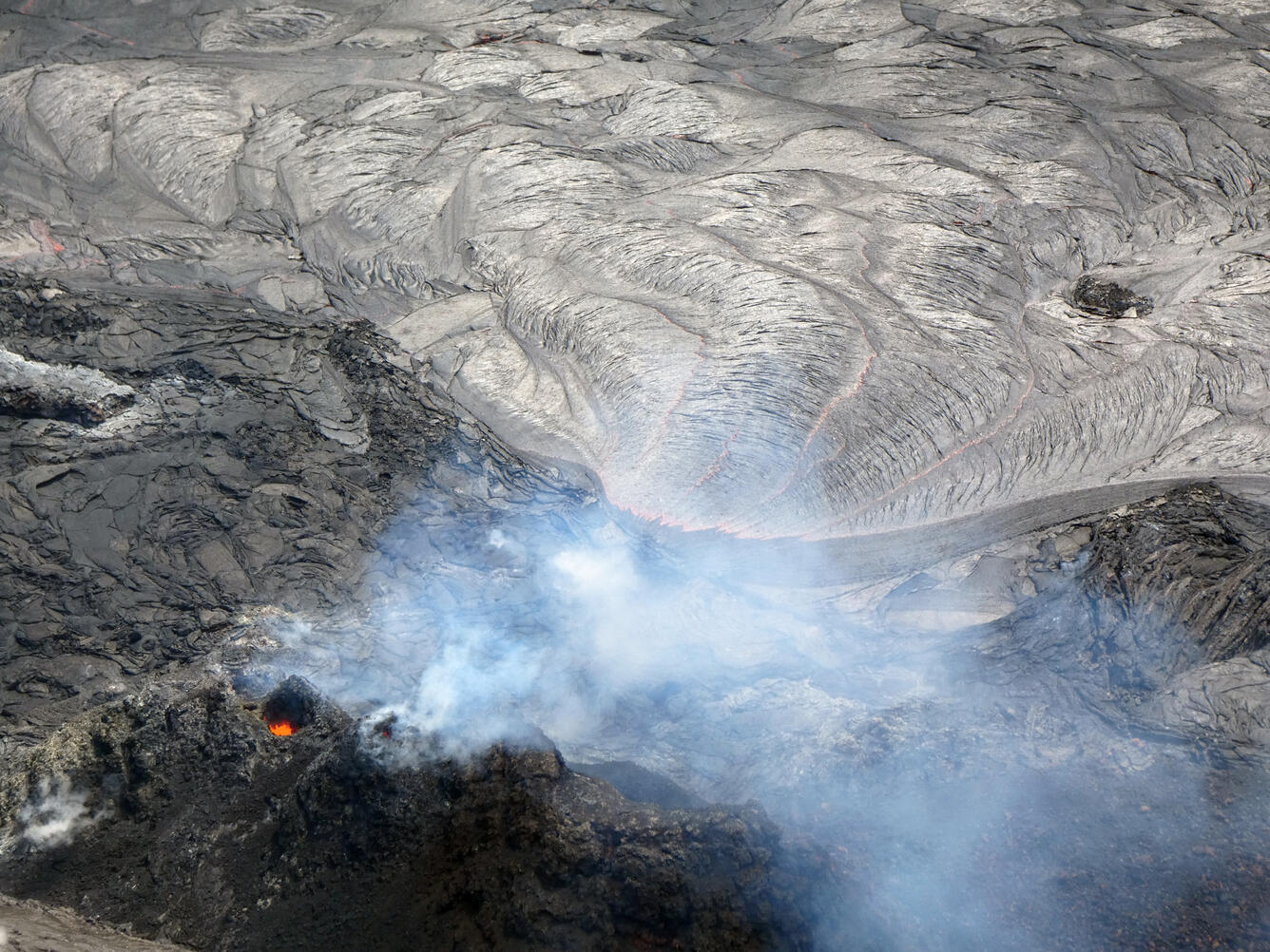 Color photograph of vent and lava