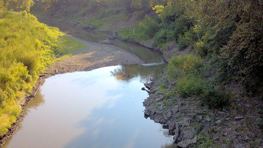 0.63 cfs at Delaware River near Muscotah, KS (06890100) on July 23, 2012. Photo by Mark Lysaught, USGS.