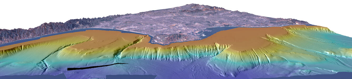 Illustration looking at the land from out over the ocean, as if the water were drained away, to show seafloor features.