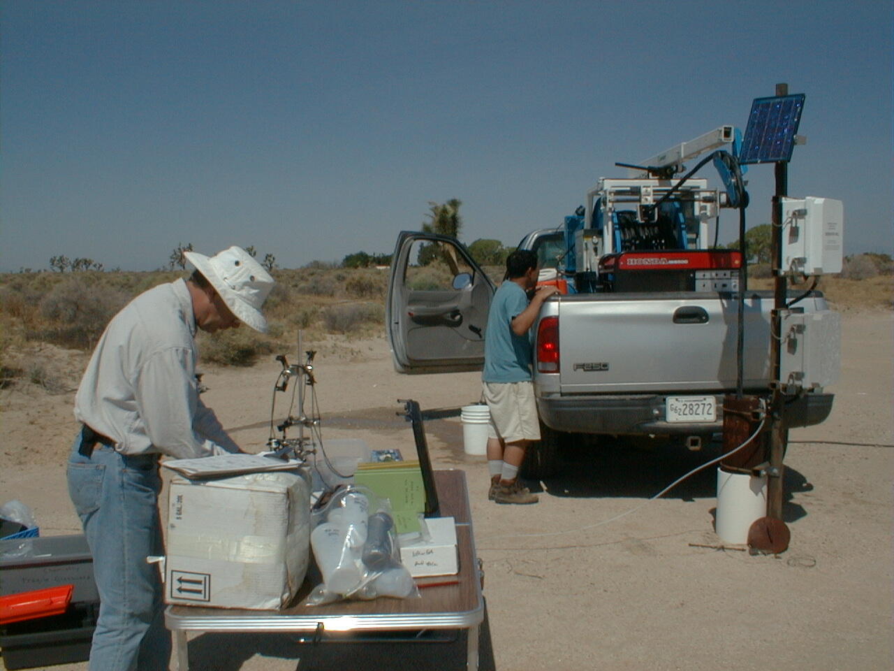 USGS scientists collecting and processing ground water samples for Cr(VI) analysis at Edwards Air Force Base, California. 