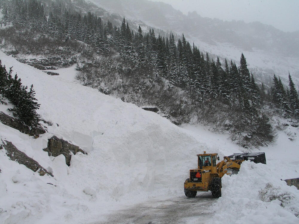 Removing avalanche debris from road