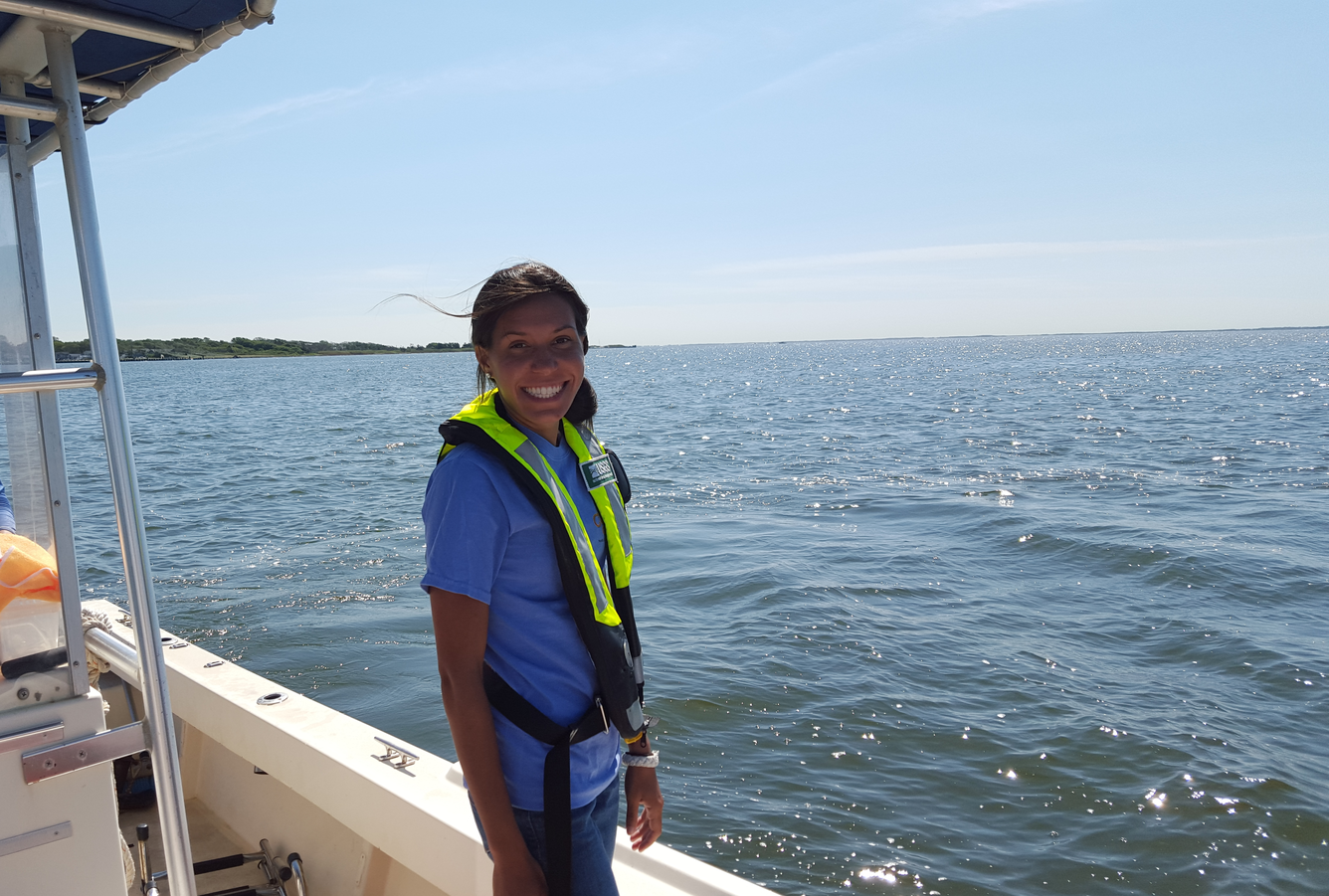 Photo of Kaitlyn Colella on a boat in the Great South Bay