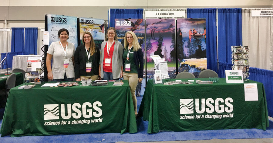 Jennifer Miselis, Caitlin Reynolds, Julie Richey, and Jennifer Flannery at the USGS exhibitor booth.