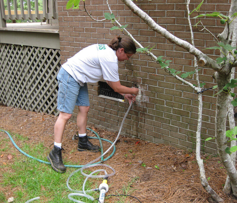 Kristen McSwain collecting residential water sample