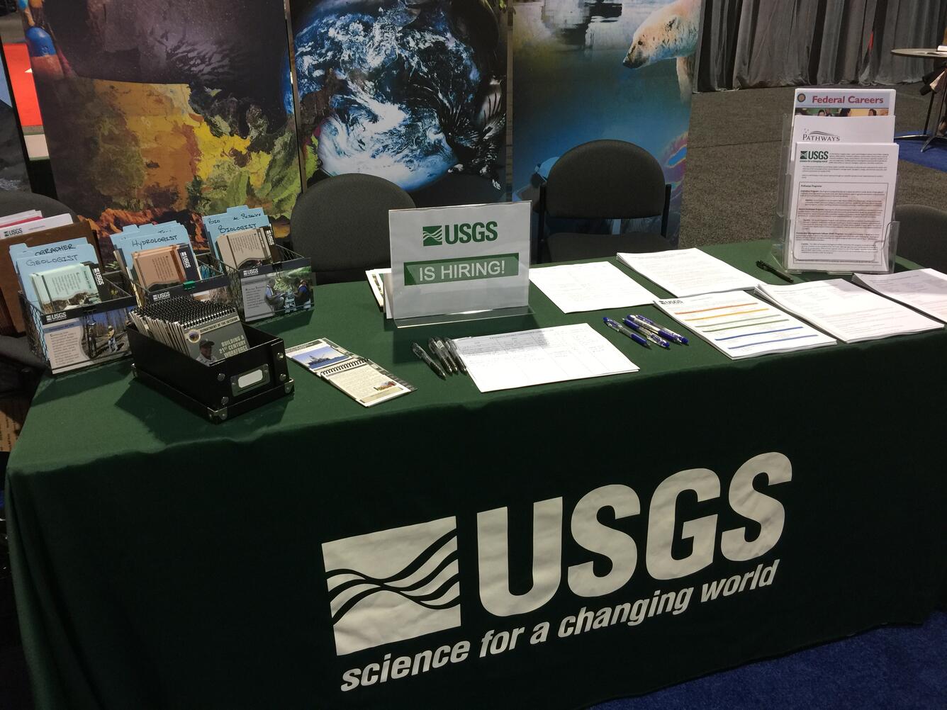 Photo of the USGS outreach booth at a conference.