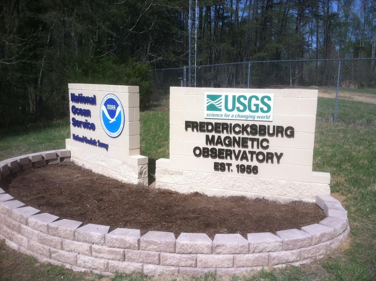 Brick signs for Fredericksburg Magnetic Observatory and National Ocean Service.