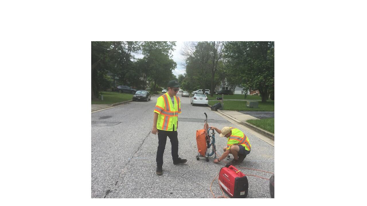 High tech vacuum and two hydrotechs on street