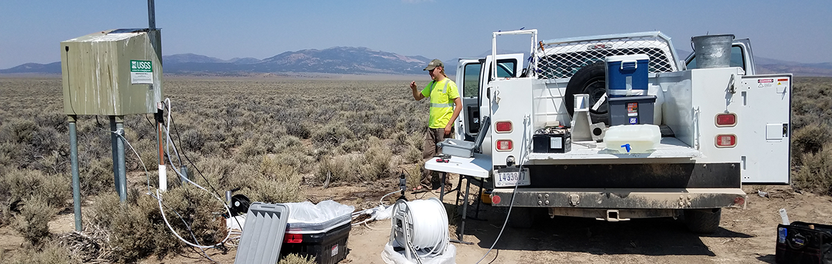 USGS scientist Daniel Riddle taking water-quality samples from a well in Eureka County, Nev.