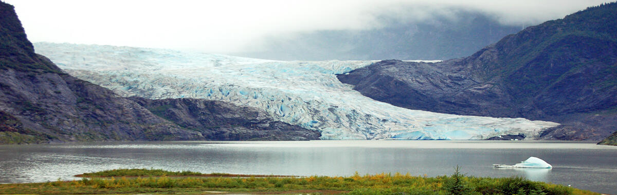 A glacier flowing into a lake