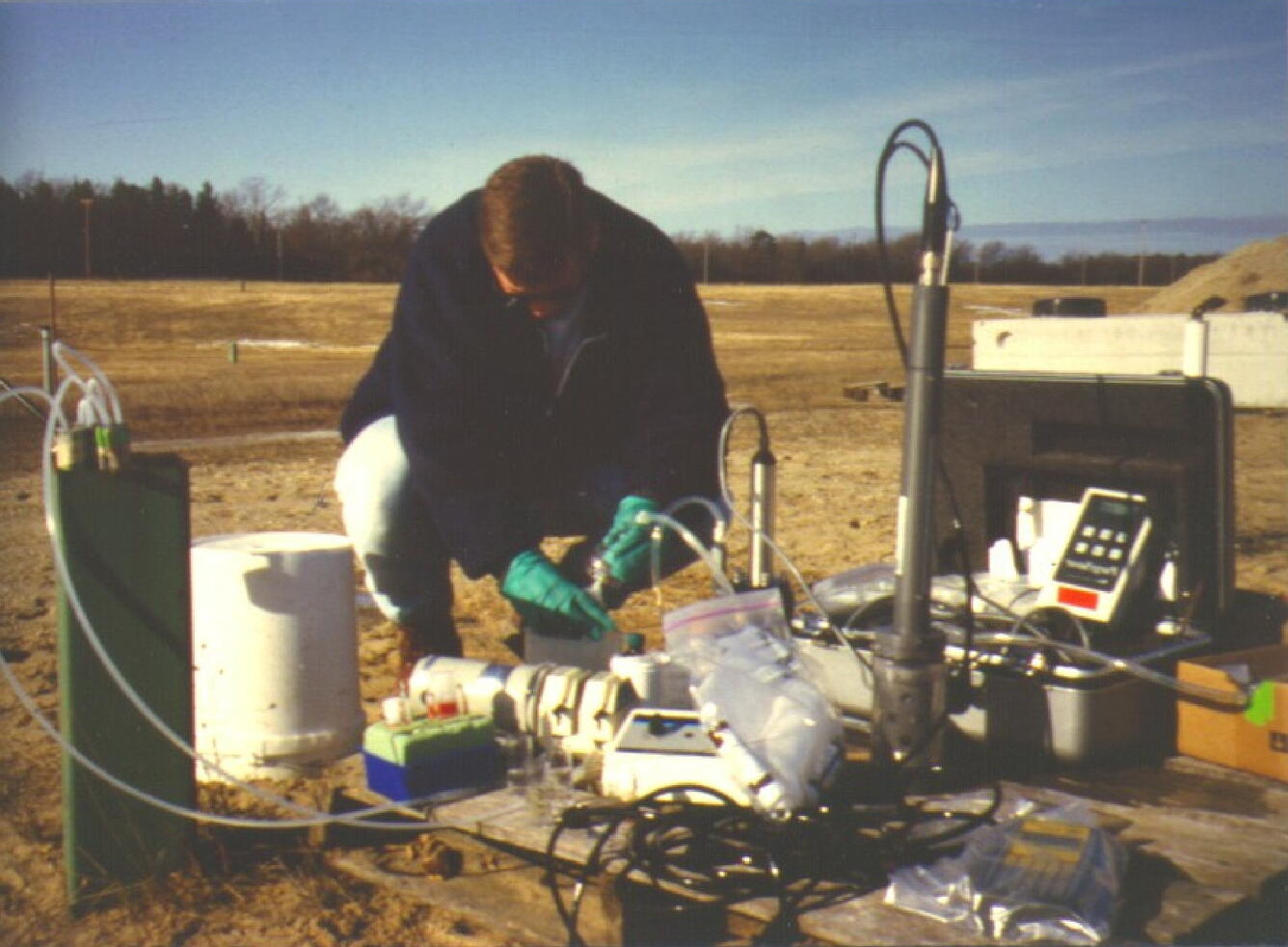 A technician is pumping water from a multi-level well during an investigation