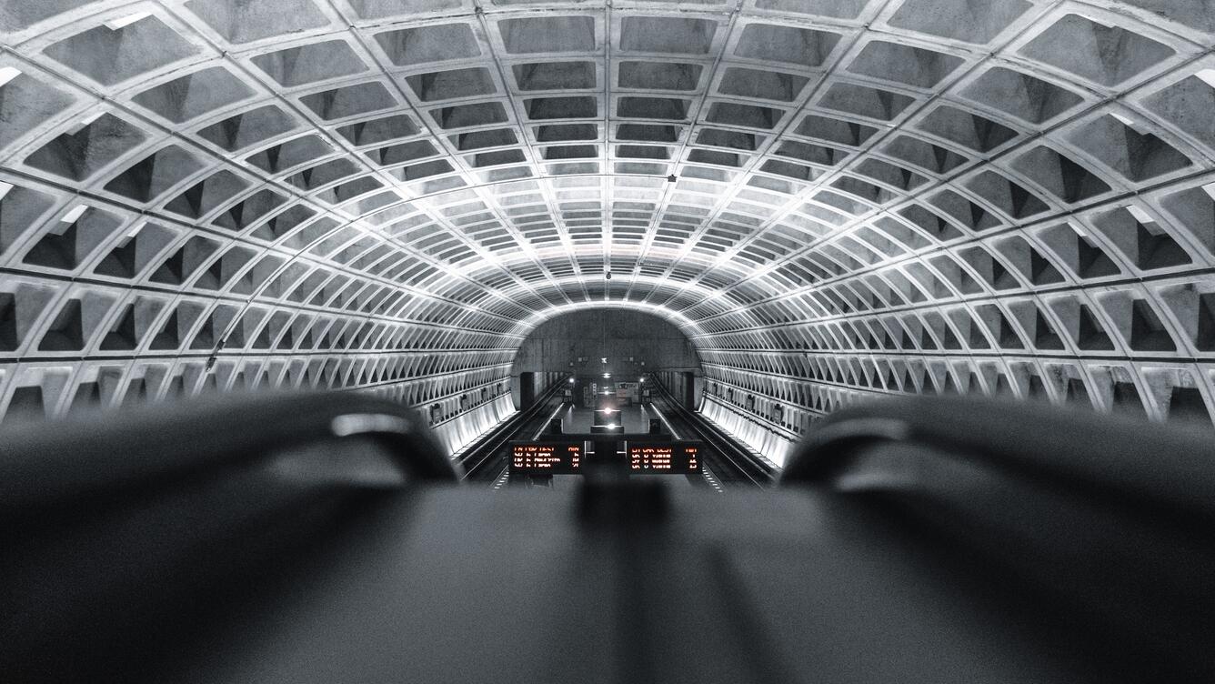 selective focus photography of white building interior/ metro/ ethics