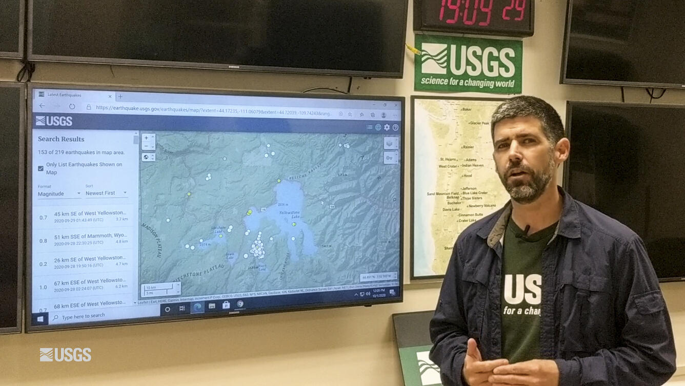 Man standing in front of TV