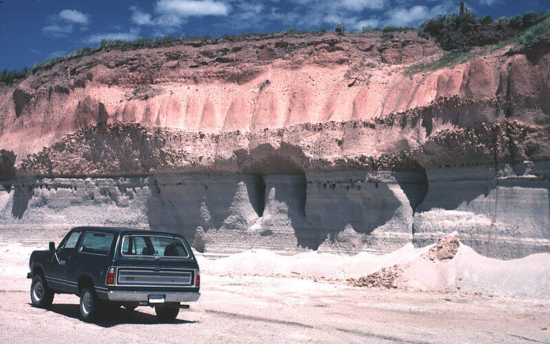 Mesa Falls ash-flow tuff and underlying fallout ash exposed in a qu...