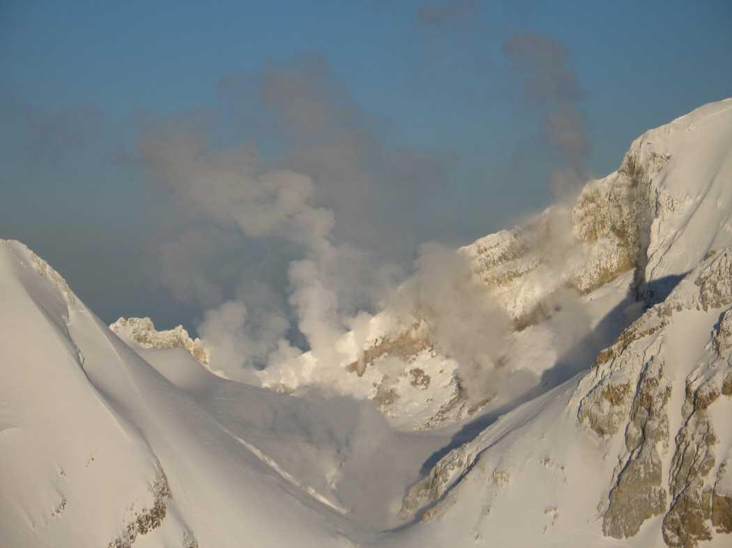 Fumaroles steaming within Sherman Crater, Mount Baker, Washington....