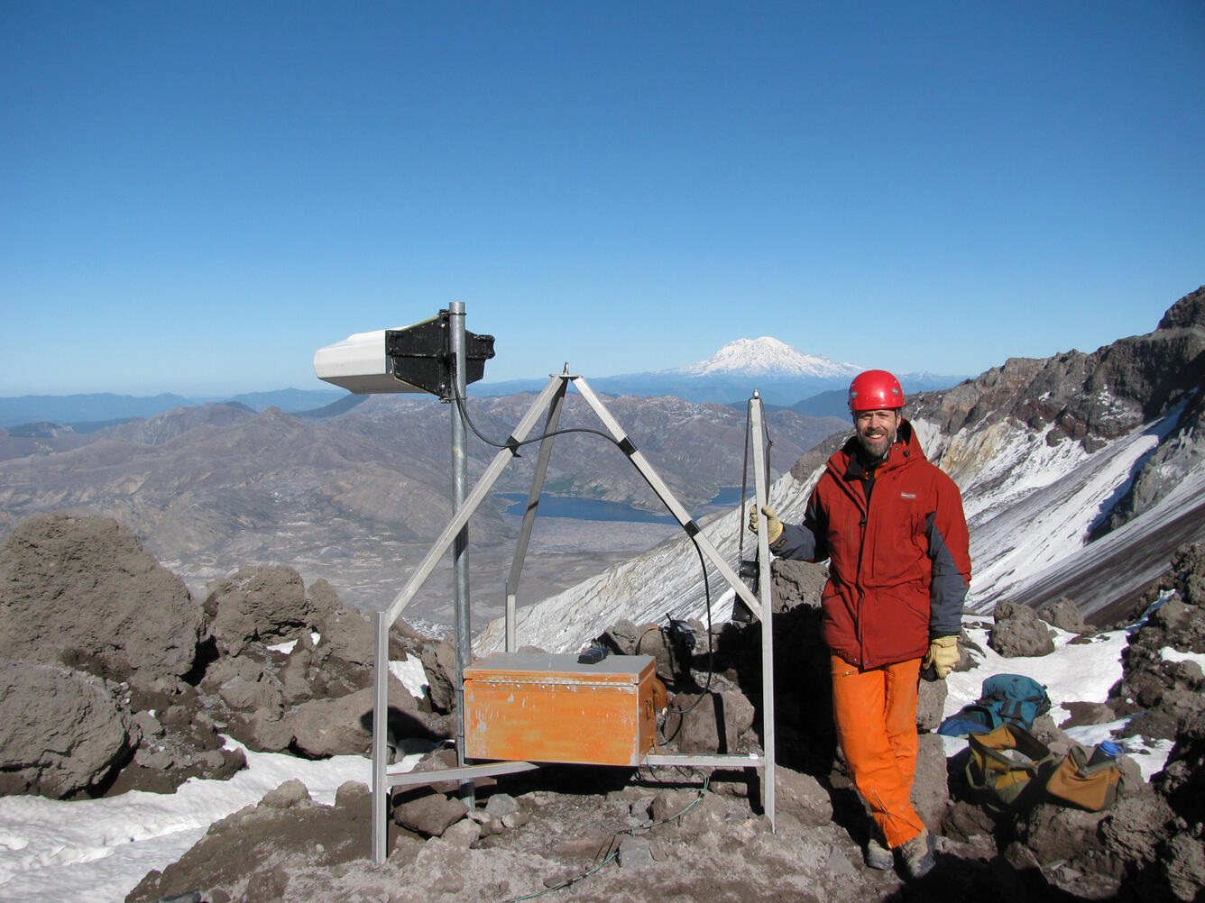 Seismologist installing equipment at station NED on Mount St. Helen...