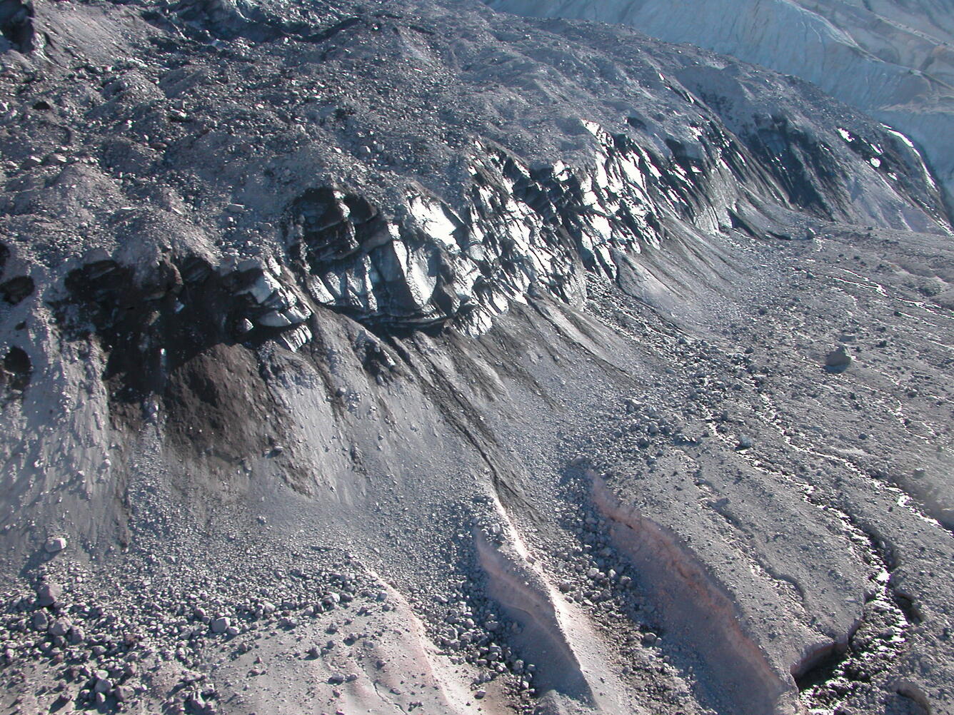 Erosional channels lead away from the northern face of Crater Glaci...