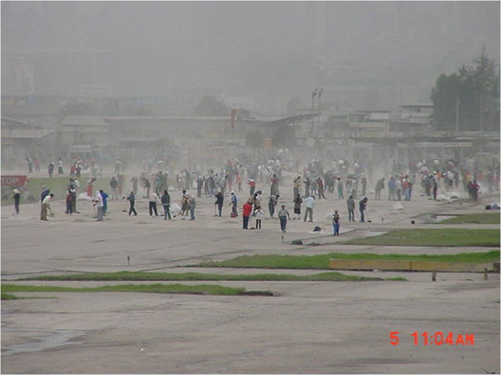 Sweeping Up Ash at Quinto International Airport...