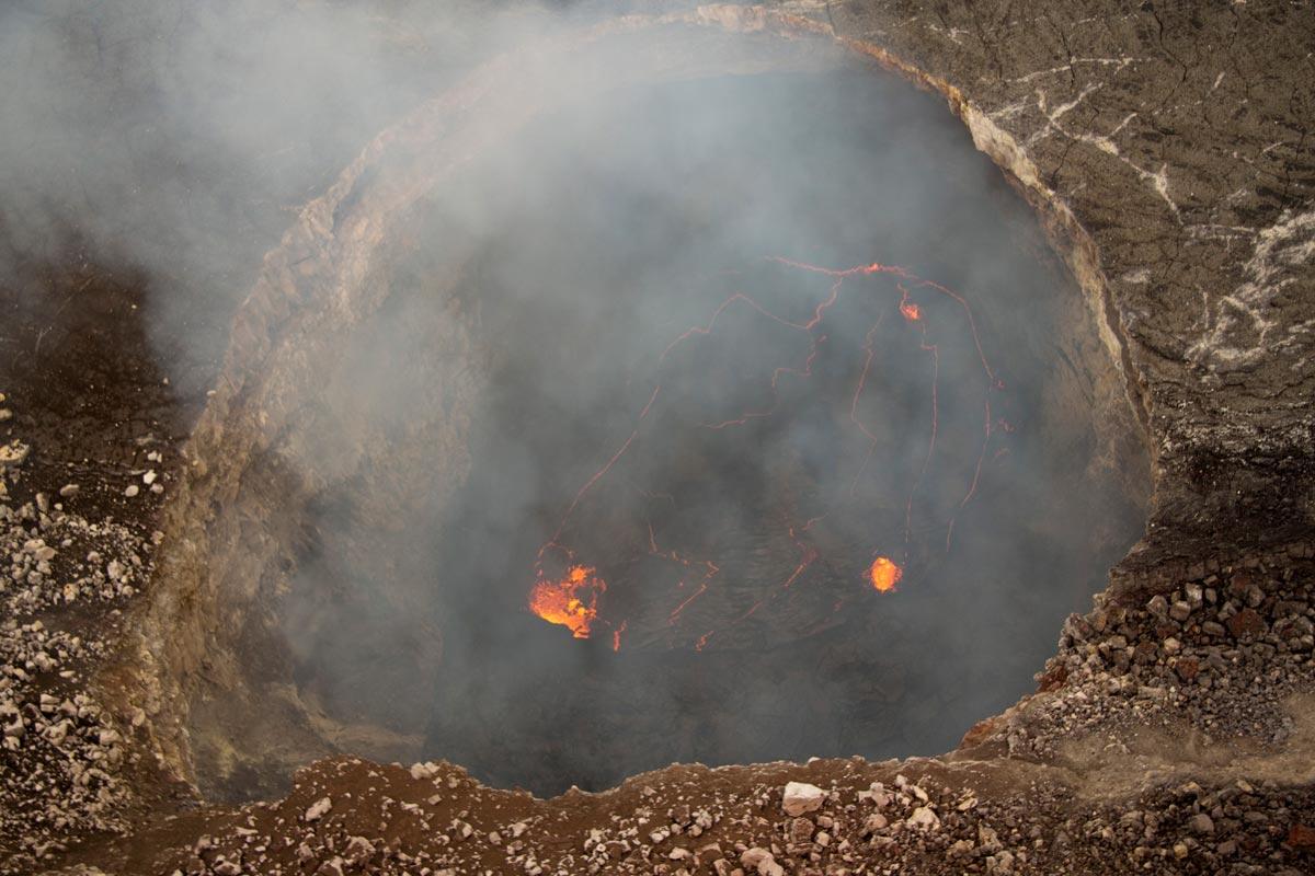 Spectacular aerial view down into the vent in Halema‘uma‘u...