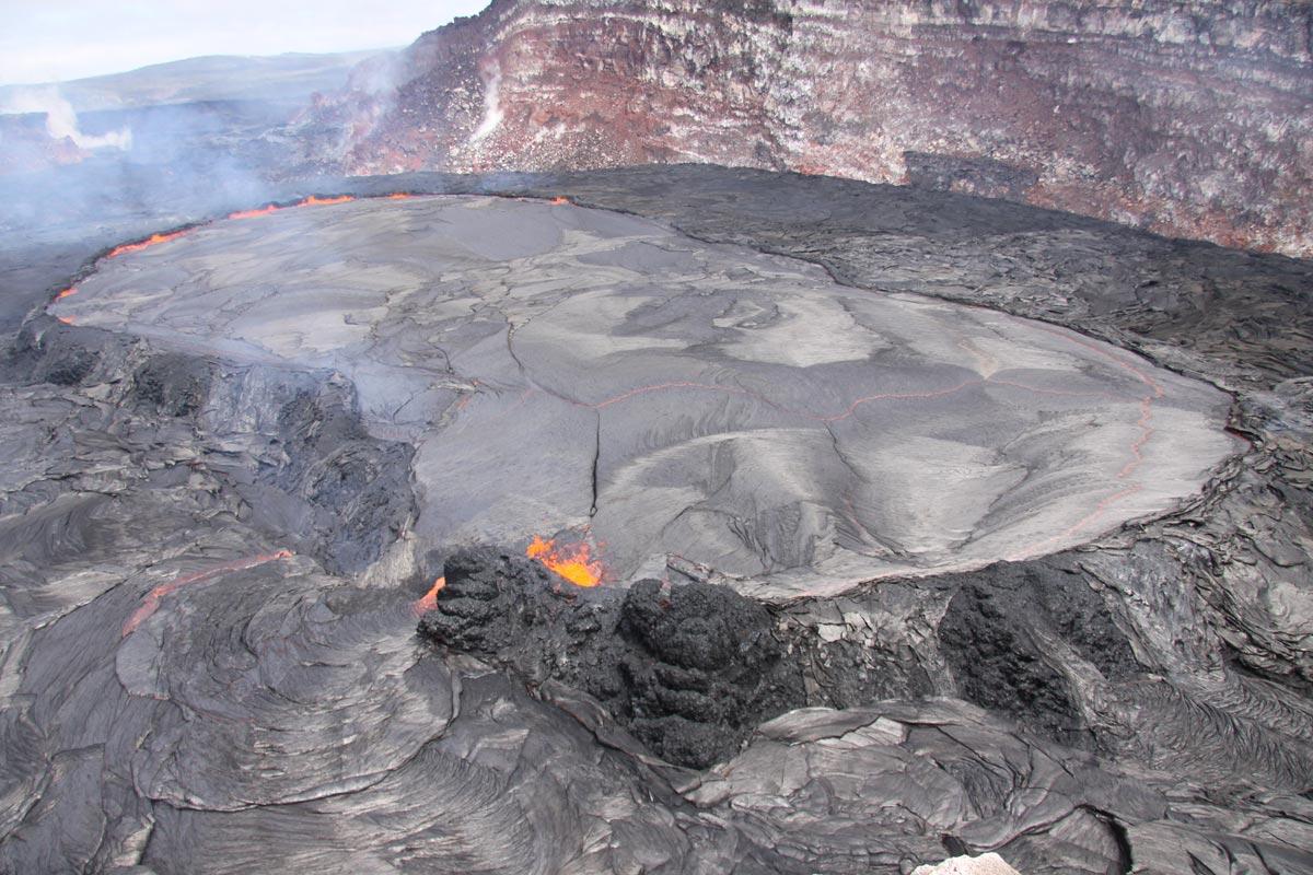 A breach in the south wall of the perched pond allowed lava to gush...