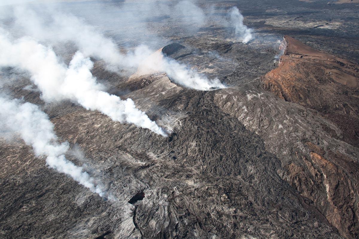 Awesome views of the Pu‘u ‘Ō‘ō cone and crater showing the fume sou...