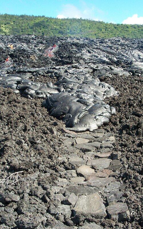 pāhoehoe toe advances over ancient Hawiian foot path ...