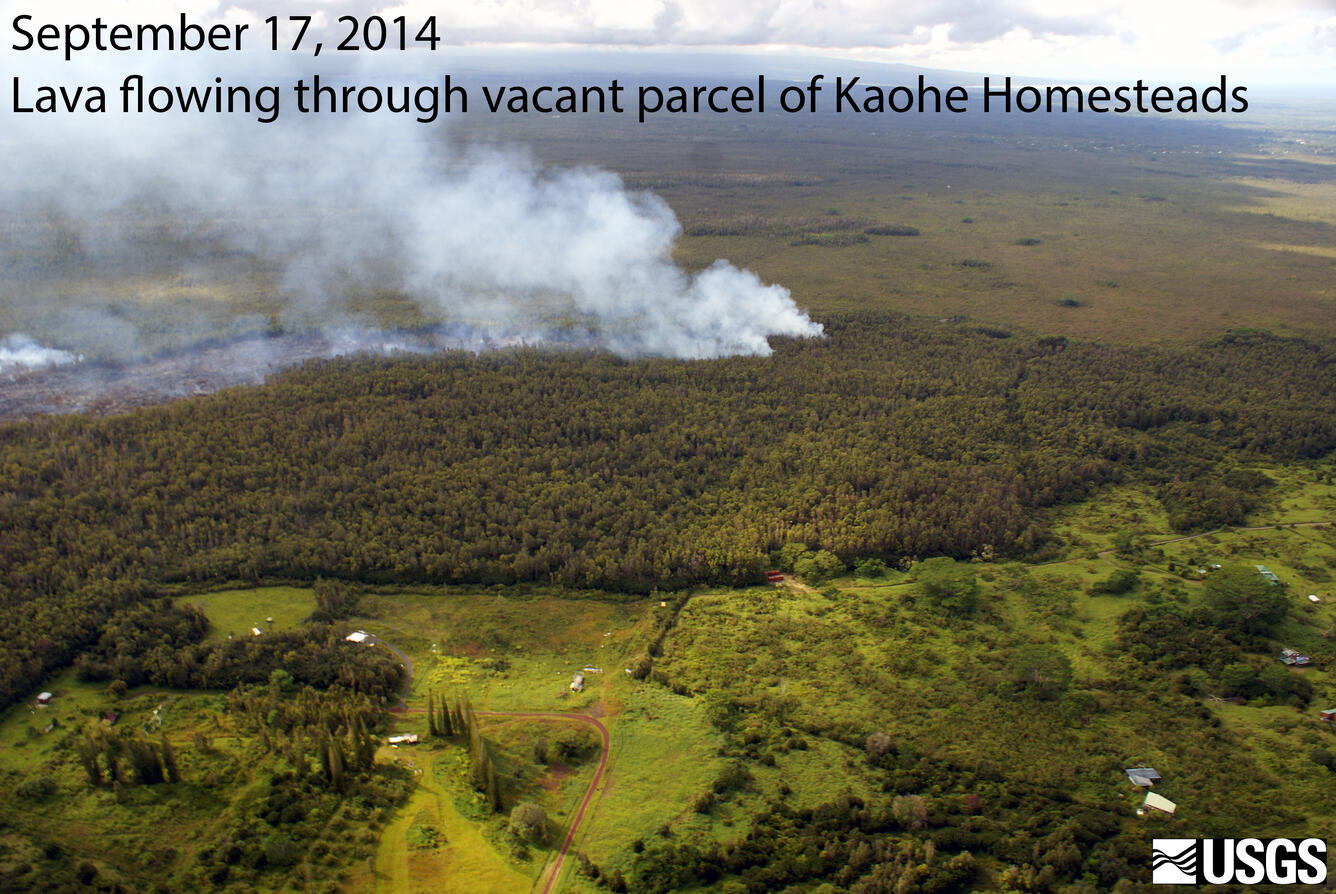 Lava from June 27 Pu‘u ‘Ō‘ō breakout flowing through vacant, forest...