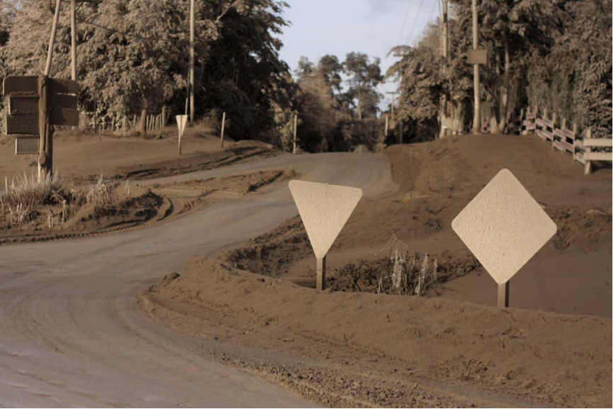 A road near Puerto Arauco, Argentina blanketed in ash from the Puye...