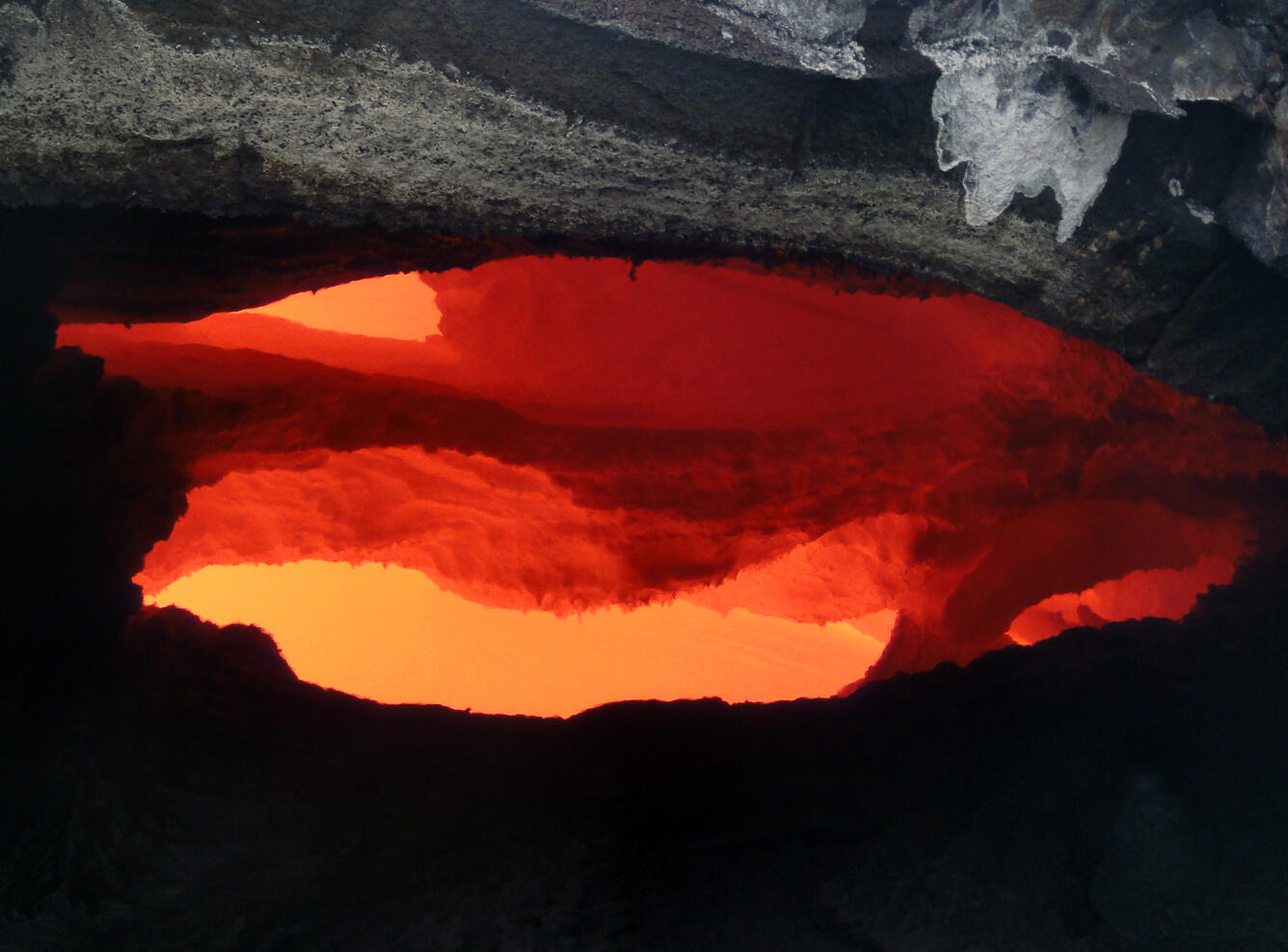 A closer look into the skylight on the June 27 lava flow, revealing...