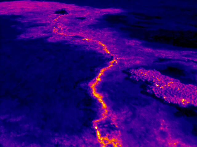 The surface flows at the front of the June 27th lava flow are fed b...