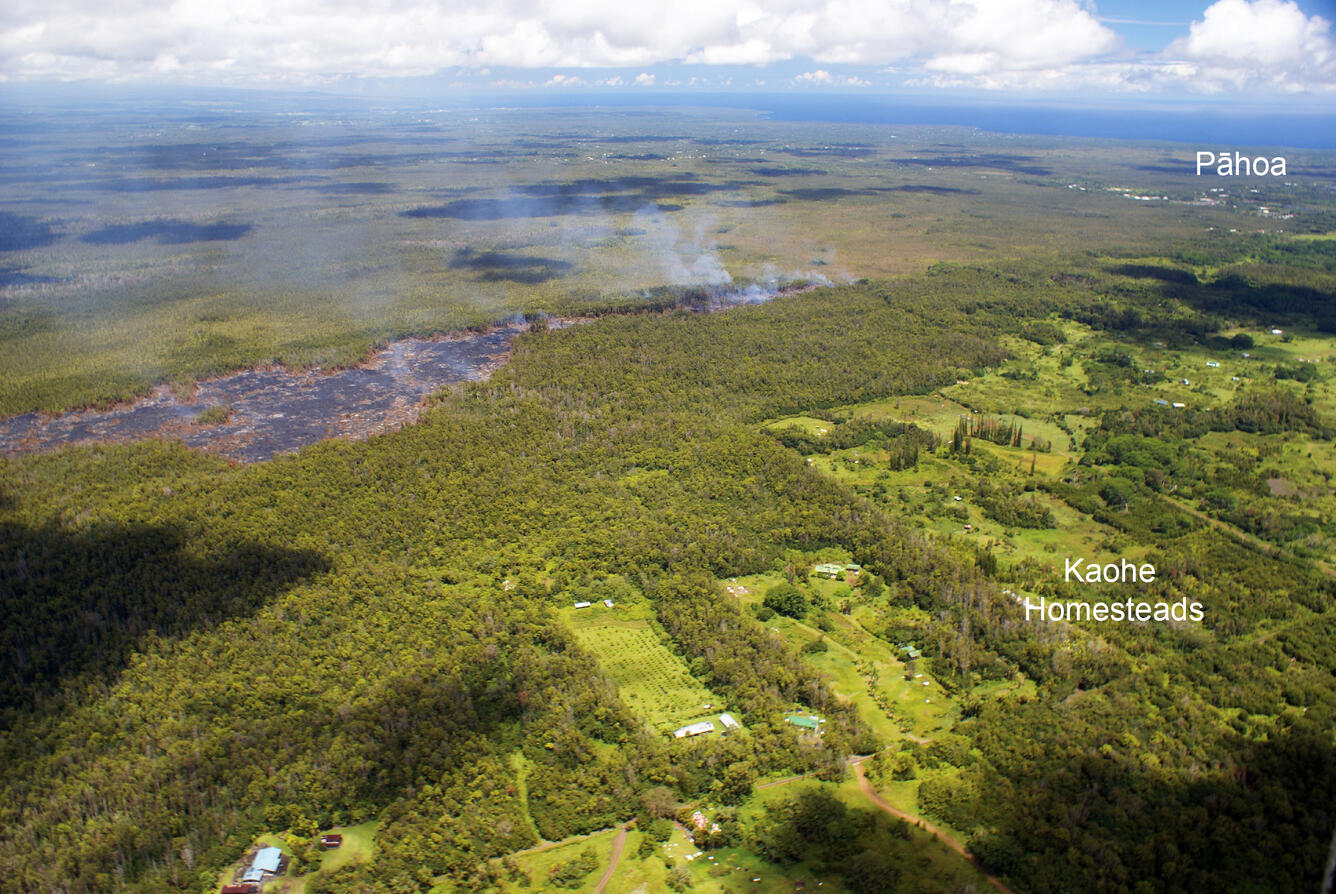 View of the flow front, looking north. Pāhoa is located in the upp...