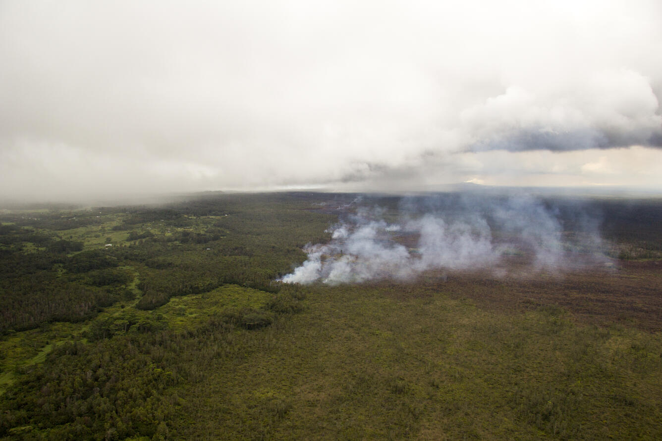 A wider view of the flow front, with Kaohe Homesteads at the left s...