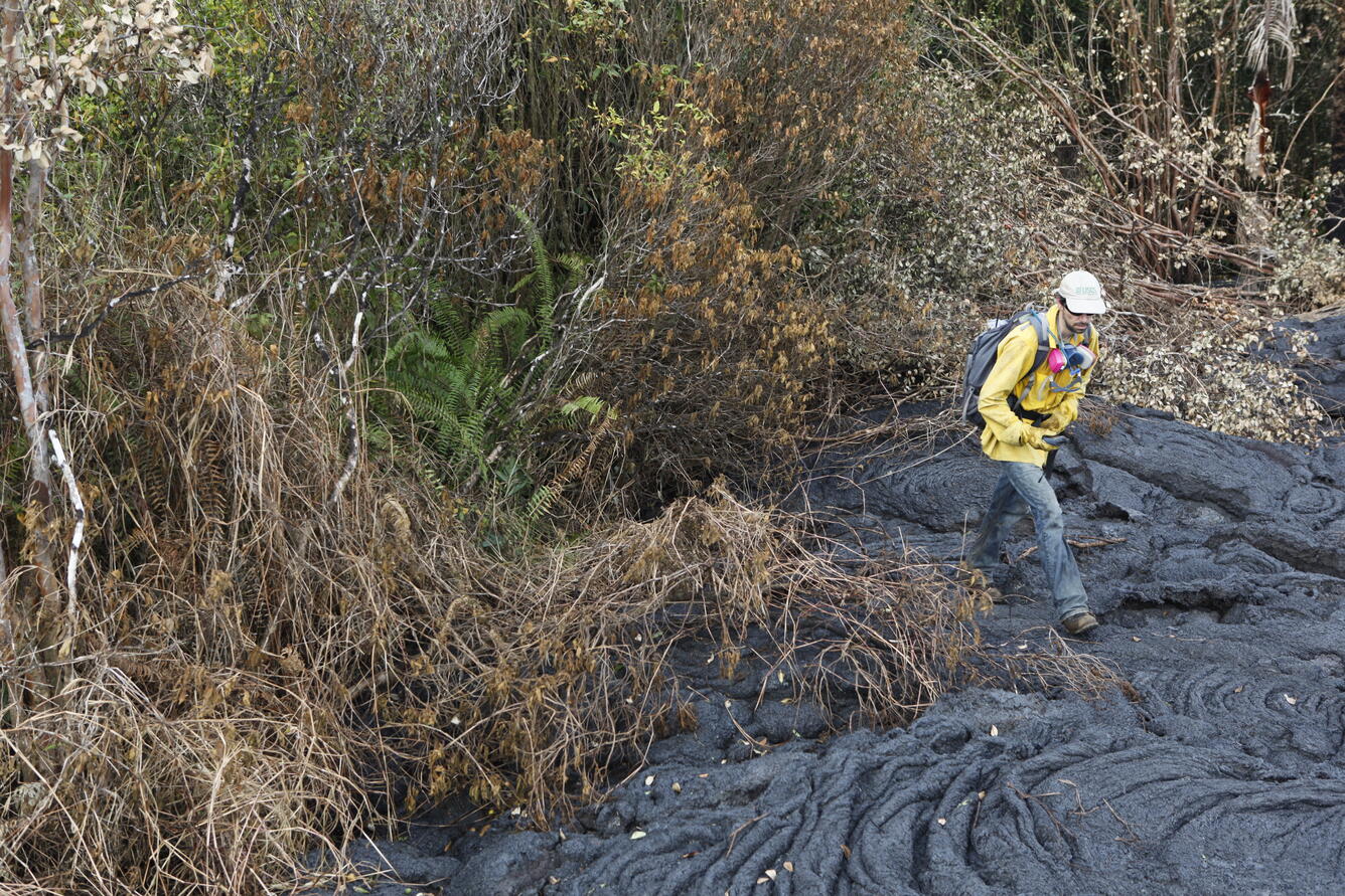 An HVO geologist maps the margin of the June 27th lava flow using G...