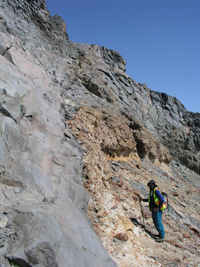 Dike (massive gray rock on the left) cuts a flank vent, Mount Raini...