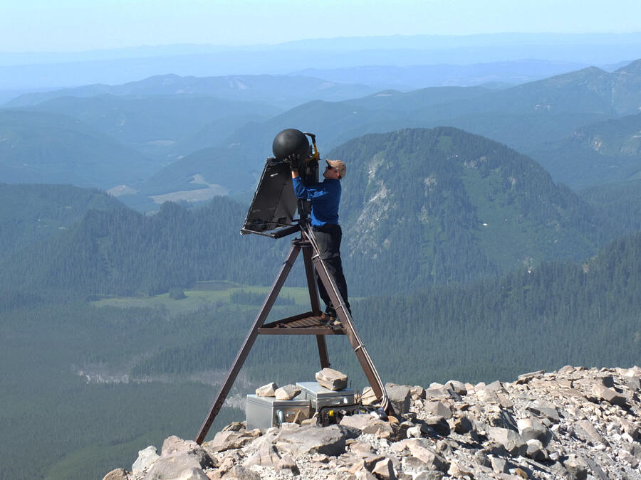 Field Engineer replaces GPS equipment damaged by winter weather at ...