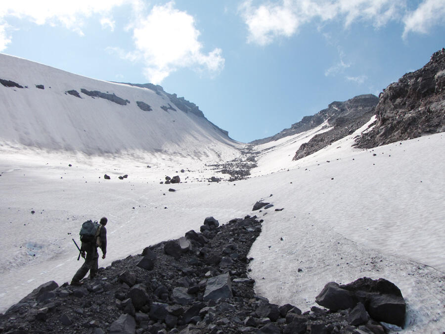 Geologist hikes toward Shoestring Notch, on the southeast flank of ...