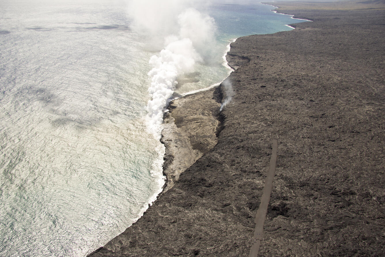 Lava entering the ocean at Kamokuna has formed a shelf-like delta t...