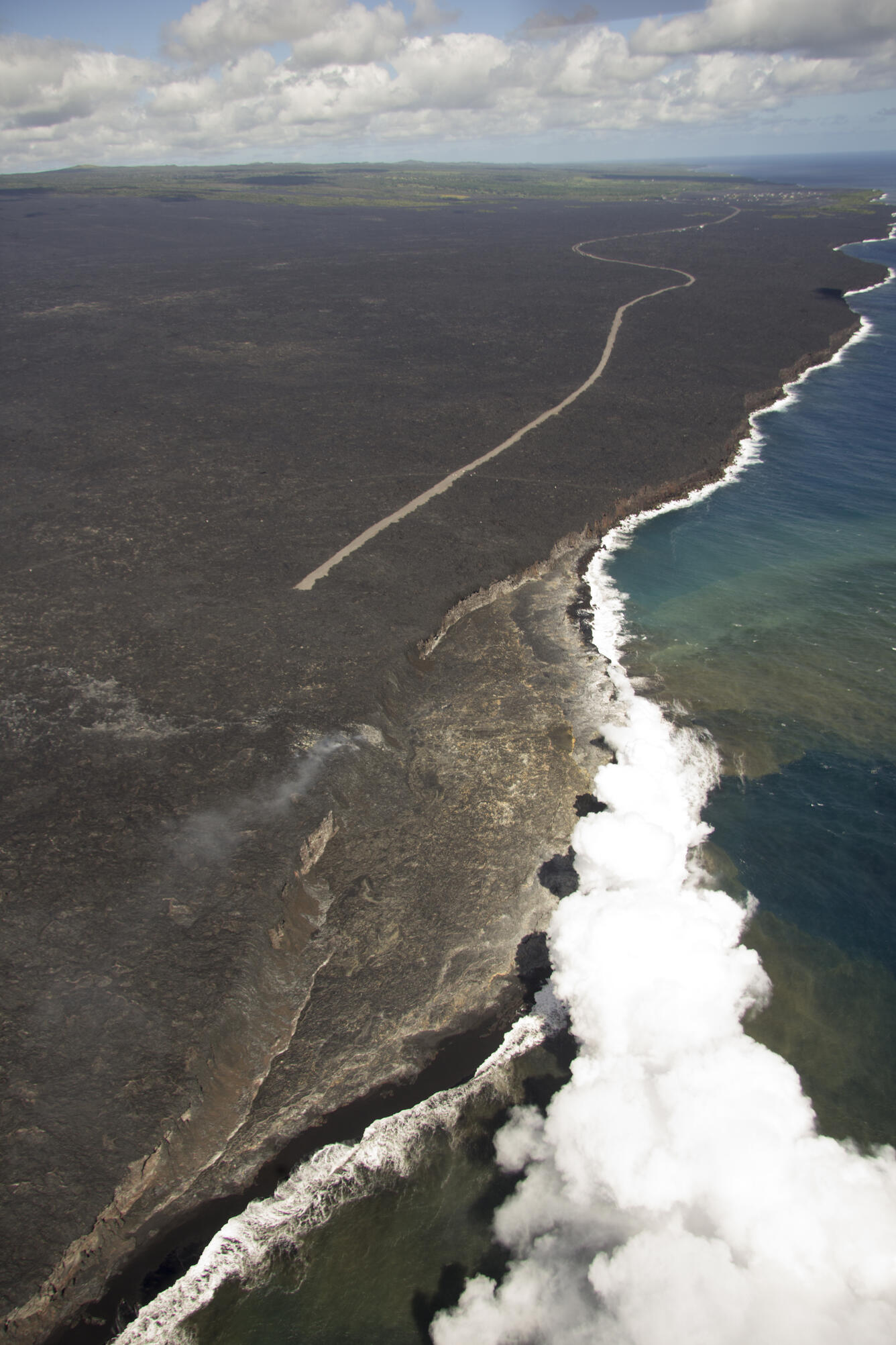 This photo shows the Kamokuna ocean entry and delta from the other ...