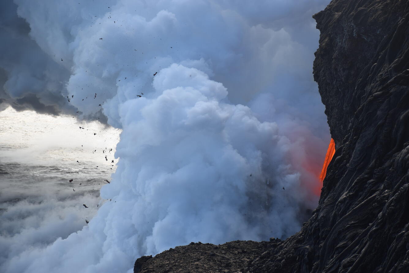 A telephoto lens captured the cascade of lava streaming from the la...