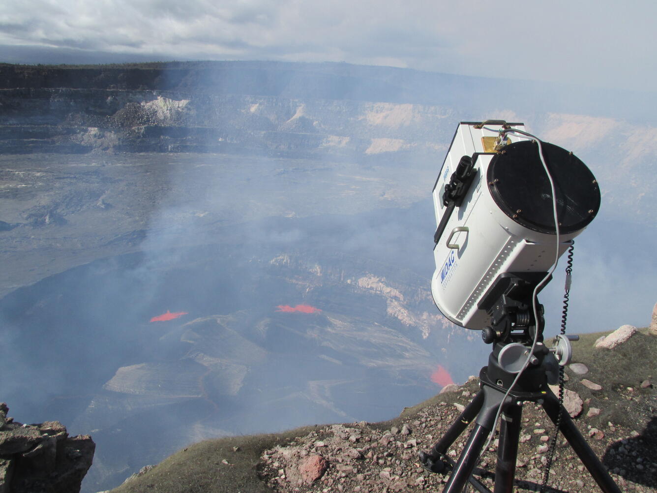 An FTIR instrument is set up on the rim of Halema‘uma‘u Crater to m...