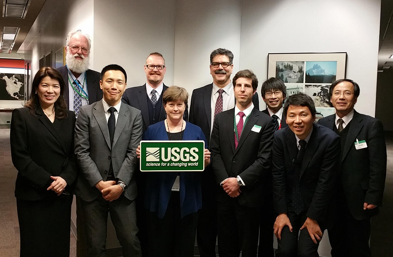 Japanese officials and scientists visit with representatives from t...