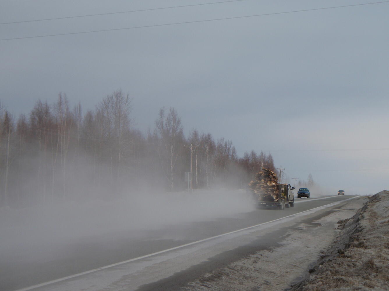 Minor ashfall resuspended by a vehicle just after ashfall, Nikiski,...