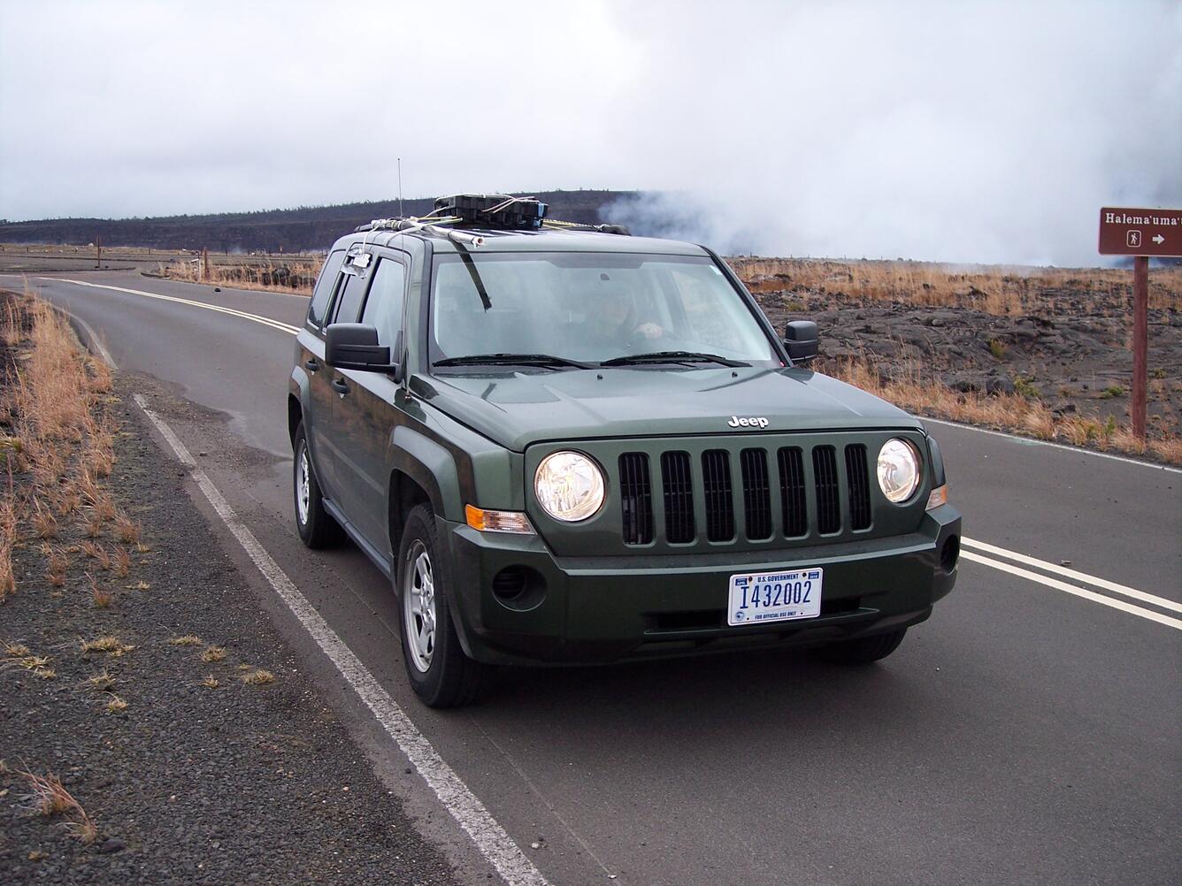 Ultraviolet spectrometer on roof of vehicle is driven beneath gas p...