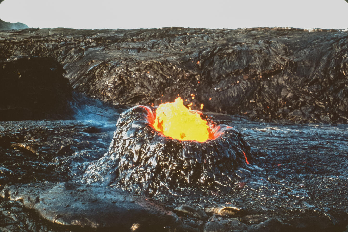 A burping driblet spire (hornito) in 'Alae Crater on May 20, 1970....