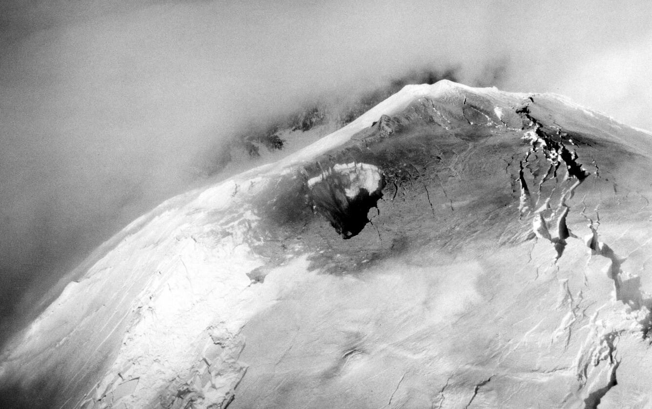 Crater in Mount St. Helens summit, aerial view looking east....