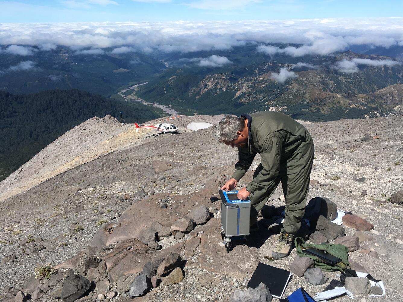 USGS scientist measures Earth's gravity field at a benchmark on the...