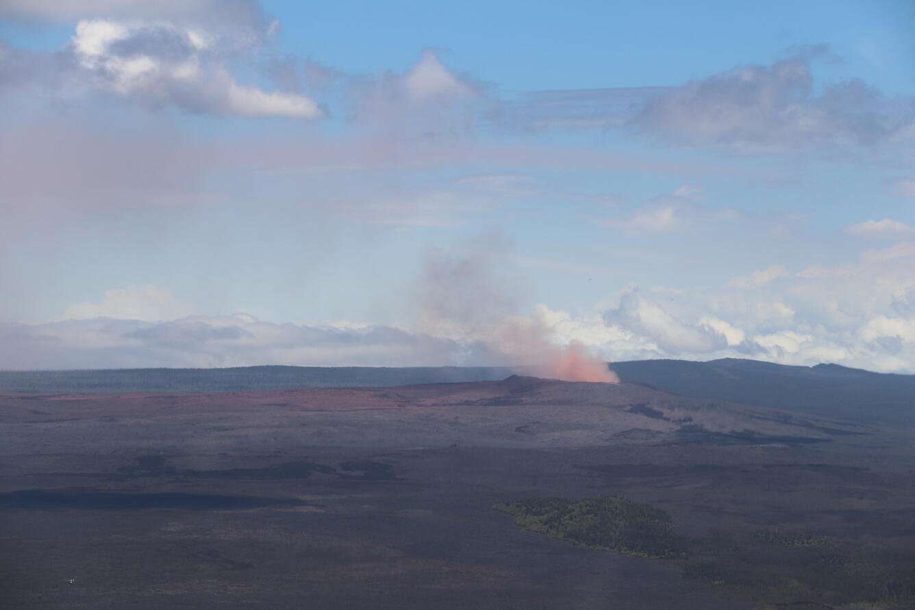 Another wide view, from the east, showing the dust-rich plume and c...