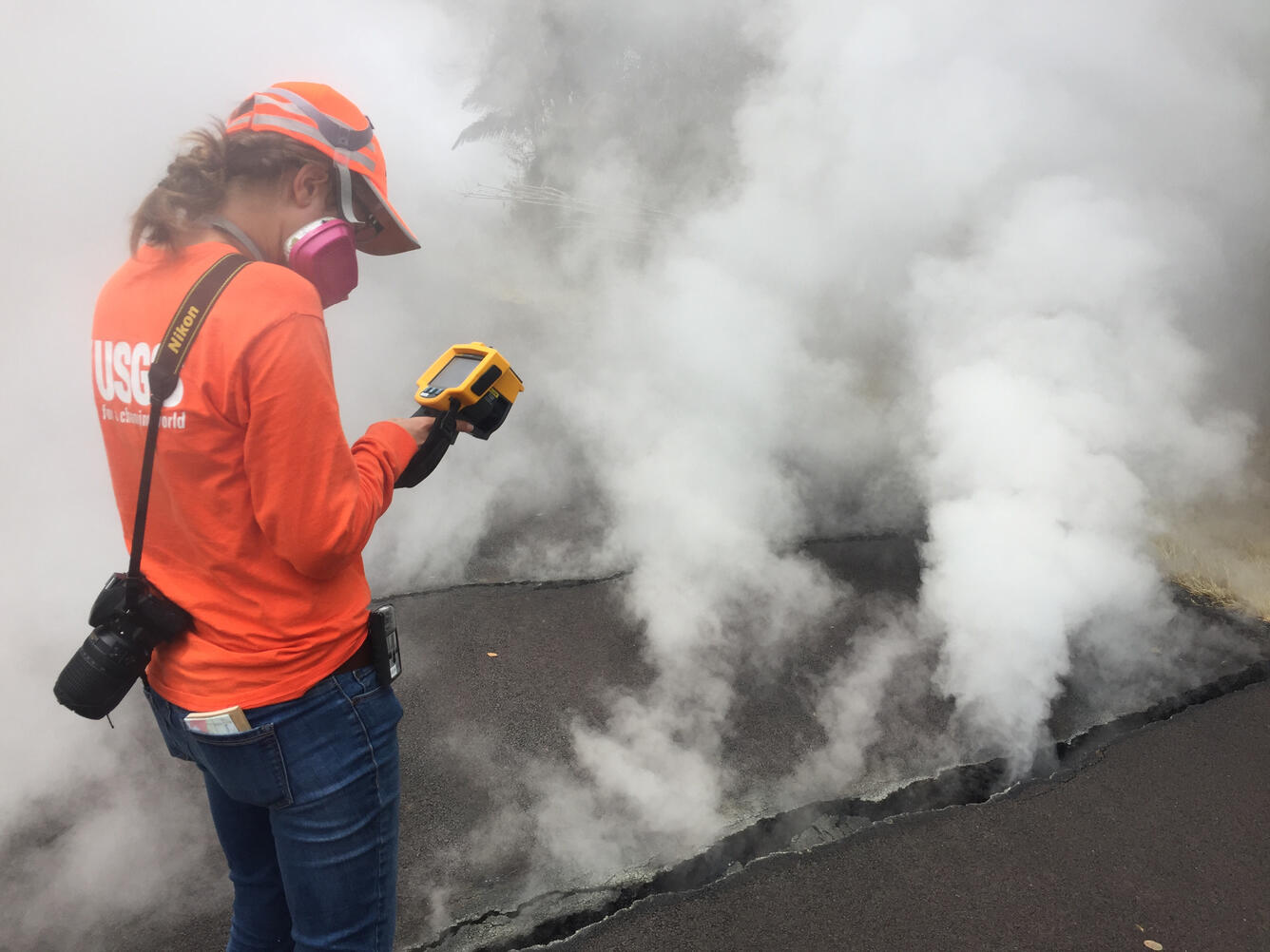 11:47 a.m. HST. Scientist measures the surface temperature of a cra...