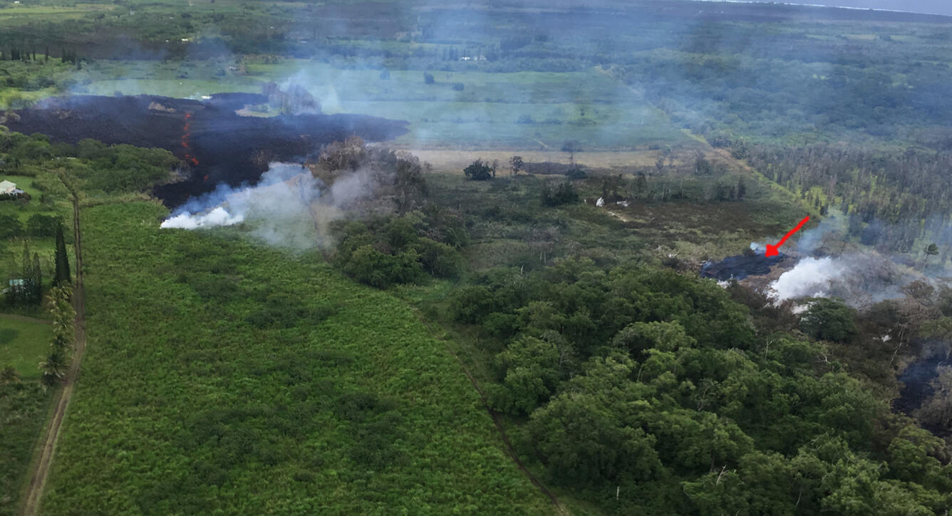 At 2:00 p.m. HST. This photo reveals a small pad of lava between ...