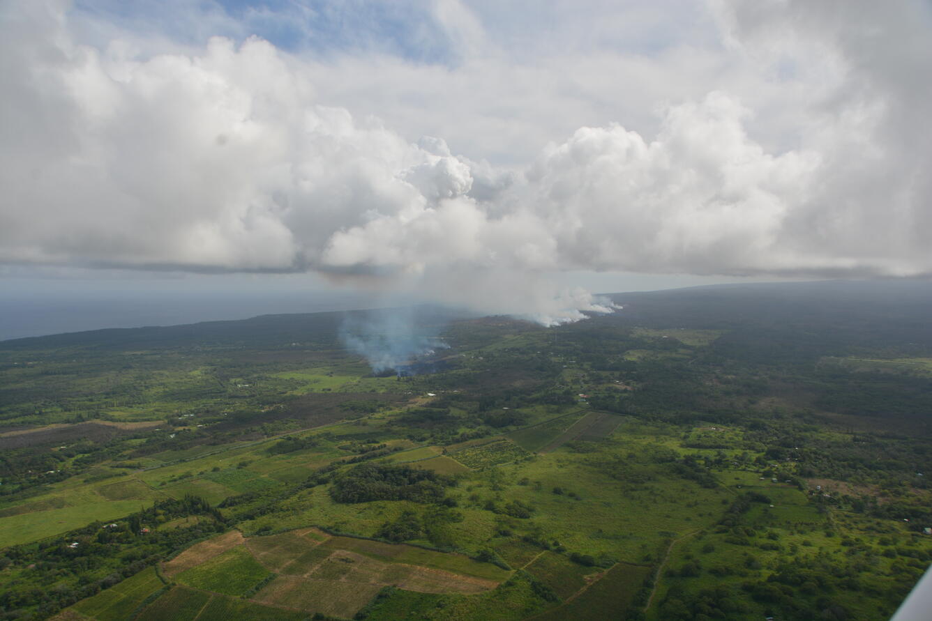 At 2:56 p.m. HST. Aerial photo of fumes from fissures and an active...